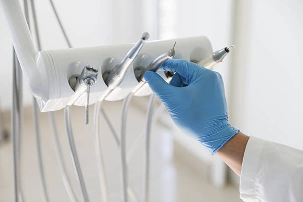 Professional Root Canal Treatment technician working in Whiskey Creek, FL